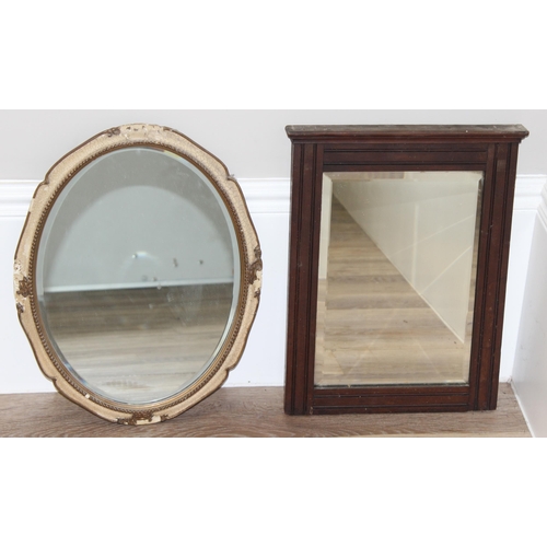 596 - 2 mirrors to incl an oval shaped easel-backed mirror with beaded frame, and a wooden-framed wall mir... 