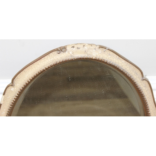 596 - 2 mirrors to incl an oval shaped easel-backed mirror with beaded frame, and a wooden-framed wall mir... 