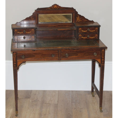 8 - In the manner of James Shoolbred, a 19th century rosewood writing desk with 2 banks of 2 small drawe... 