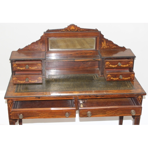 8 - In the manner of James Shoolbred, a 19th century rosewood writing desk with 2 banks of 2 small drawe... 