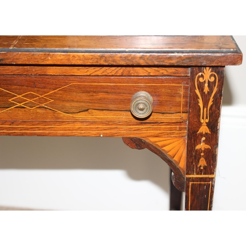 8 - In the manner of James Shoolbred, a 19th century rosewood writing desk with 2 banks of 2 small drawe... 