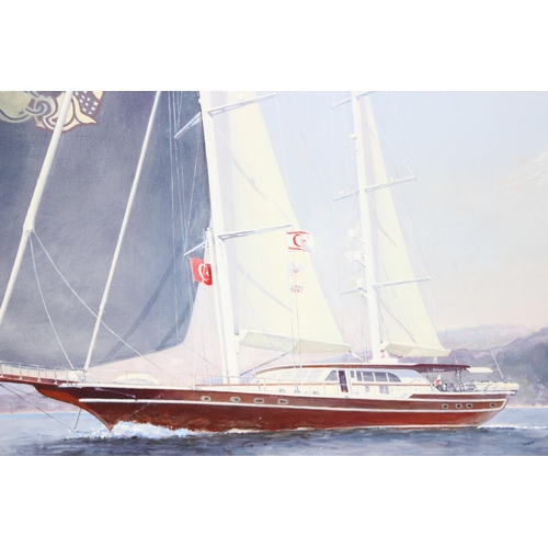 597 - Large oil on canvas on board of a sailing yacht seascape, indistinctly signed, approx 86 x 59cm