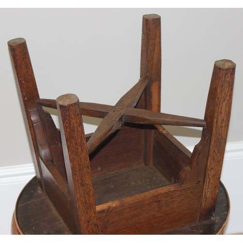 56 - A pair of early 20th century copper top circular tables with X cross stretchers, possibly Tavern tab... 