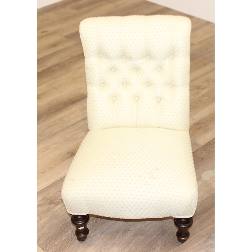 137 - An antique button back nursing chair with cream upholstery, approx 48cm wide x 38cm deep x 72cm tall