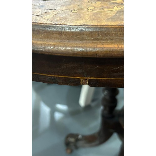 158 - A Victorian oval topped walnut table with decorative pillar base, approx 92cm wide x 57cm deep x 69c... 