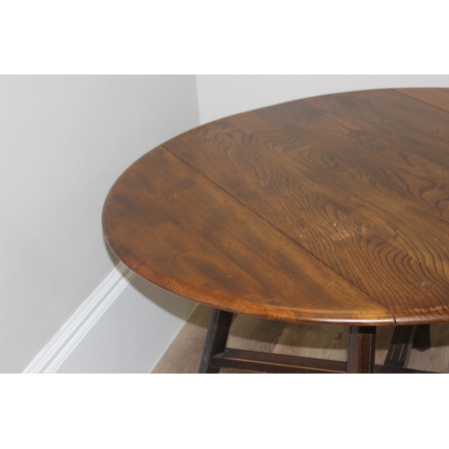 10 - Mid-century Ercol Elm and Beech Old Colonial 377 drop-leaf table, approx 114 W x 103 D x 71cm H