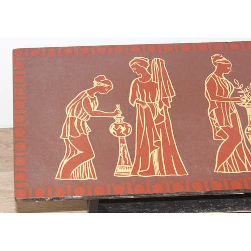 11 - Mid-century retro Melamine topped coffee table in red with Grecian figure decoration, approx 114 W x... 