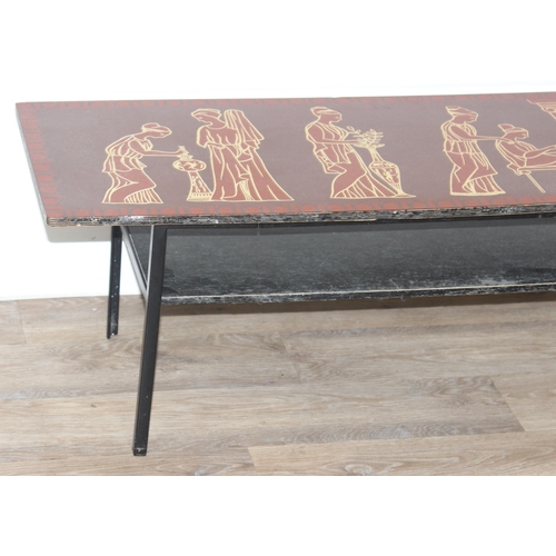 11 - Mid-century retro Melamine topped coffee table in red with Grecian figure decoration, approx 114 W x... 