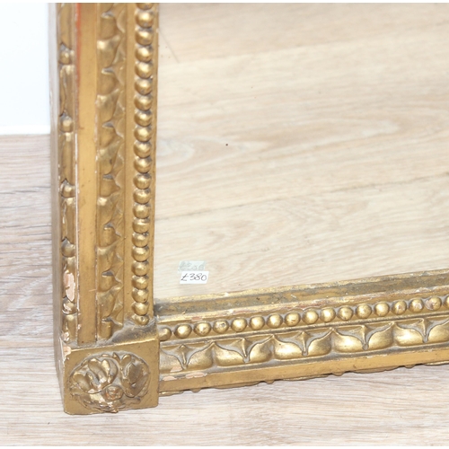 458 - Antique gilt framed mirror with decorative carved wooden fruit and scrolls to top, likely 19th centu... 