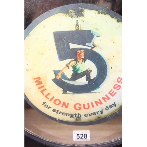 528 - Vintage bevelled edge advertising wall mirror in painted hexagonal frame for '5 Million Guinness For... 