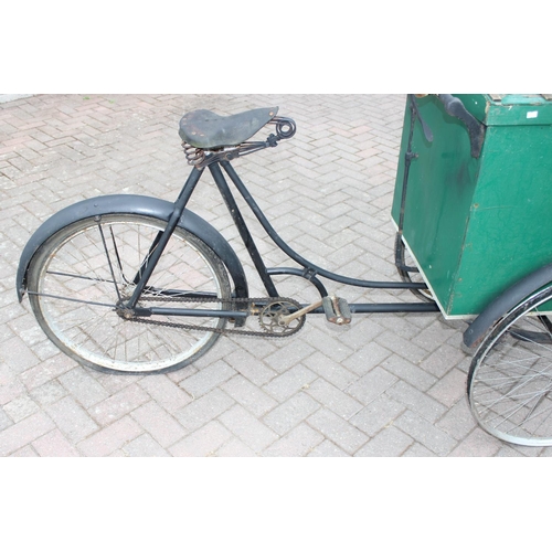 300 - Antique Tradesman's box tricycle with sprung saddle and green painted trade box, approx 208cm W x 80... 