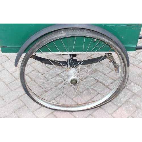 300 - Antique Tradesman's box tricycle with sprung saddle and green painted trade box, approx 208cm W x 80... 