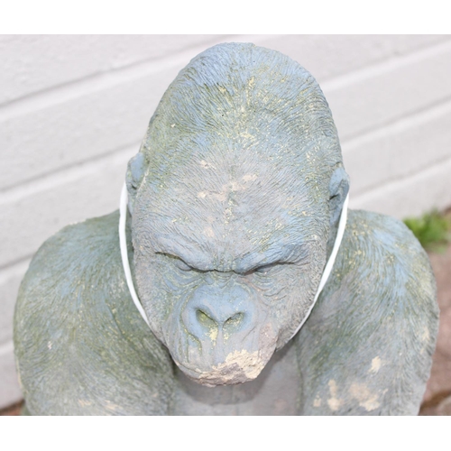 301 - Concrete garden ornament of a silverback gorilla, approx 46cm H