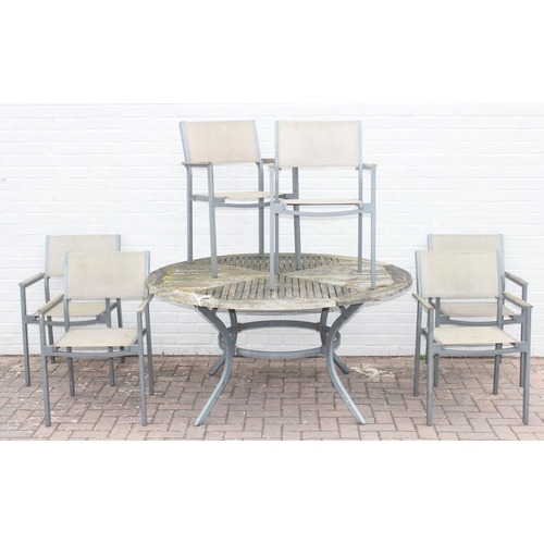 306 - Circular teak garden table and 6 chairs by Hartman, approx 150cm W x 73cm H