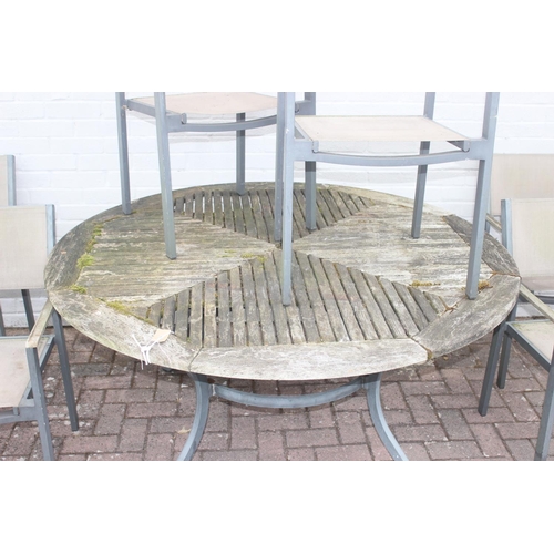 306 - Circular teak garden table and 6 chairs by Hartman, approx 150cm W x 73cm H