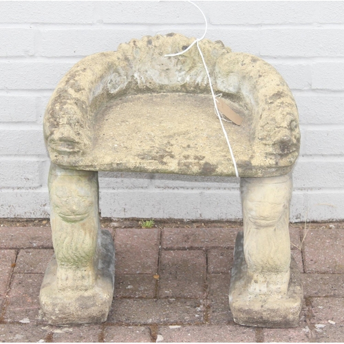 310 - Child's concrete 3-piece seat with lion supports, approx 47cm x 40cm H