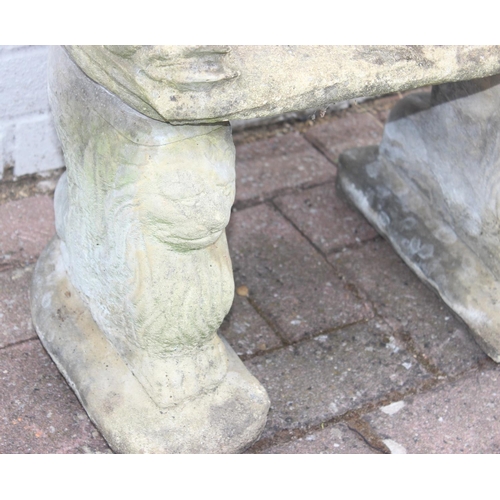 310 - Child's concrete 3-piece seat with lion supports, approx 47cm x 40cm H