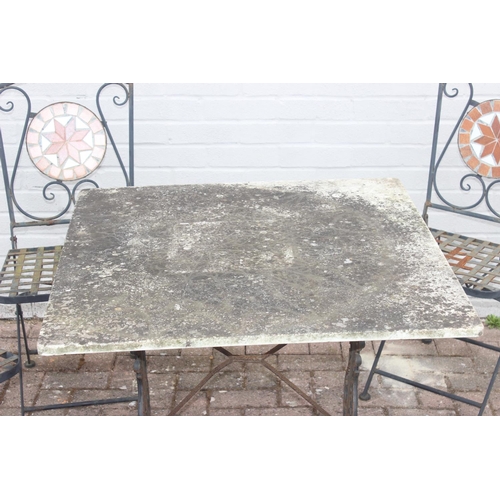 312 - Loose-topped marble garden table with cast iron base and 4 folding mosaic-backed wrought iron garden... 