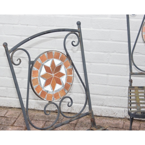 312 - Loose-topped marble garden table with cast iron base and 4 folding mosaic-backed wrought iron garden... 