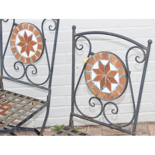 312 - Loose-topped marble garden table with cast iron base and 4 folding mosaic-backed wrought iron garden... 