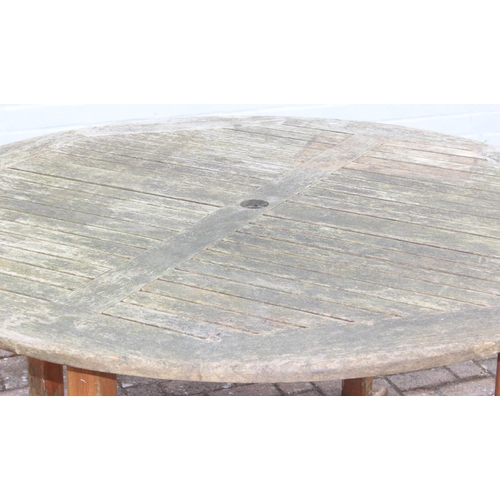 313 - Round teak garden table, 150cm diam x 75cm H