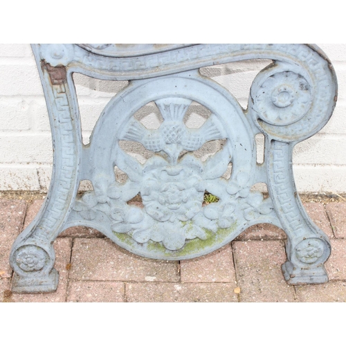 316 - Pair of cast iron bench ends, with thistle motif design, approx 88cm H