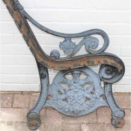 316 - Pair of cast iron bench ends, with thistle motif design, approx 88cm H