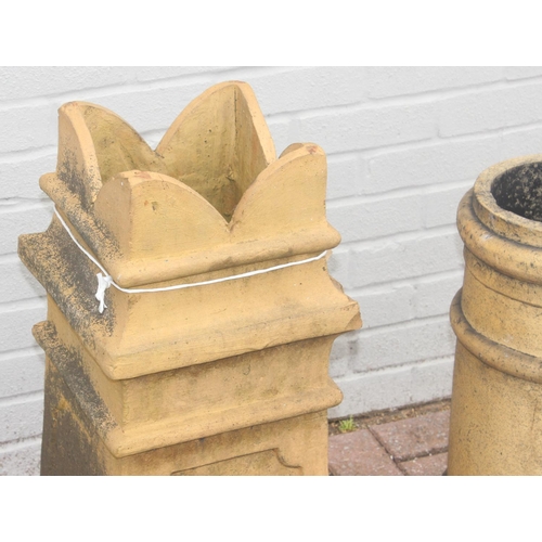 317 - 2 clay chimney pots, the smaller marked Doulton and the other with Bishop's hat design, tallest appr... 