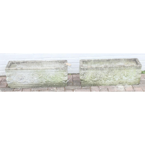 319 - Pair of oblong concrete planters with scrolled design, approx 72 x 24 x 26cm