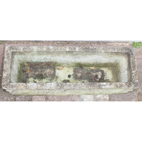 319 - Pair of oblong concrete planters with scrolled design, approx 72 x 24 x 26cm