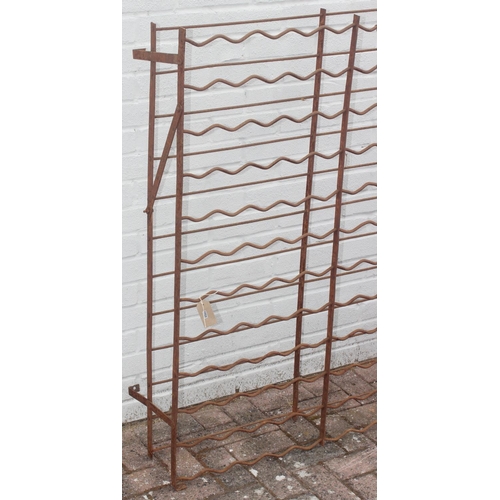 323 - 2 weathered wall mountable wine racks, total hold of 200 bottles