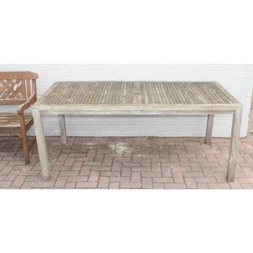 324 - Teak oblong garden table for John Lewis, approx 180cm x 90cm x 75cm, and a teak garden bench (2)