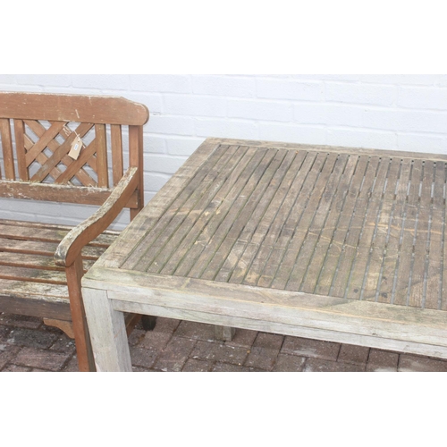 324 - Teak oblong garden table for John Lewis, approx 180cm x 90cm x 75cm, and a teak garden bench (2)