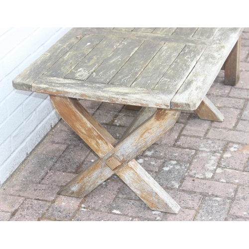 325 - Teak garden bench, and a small wooden garden table with cross banded legs, both by Woodfurn, bench a... 