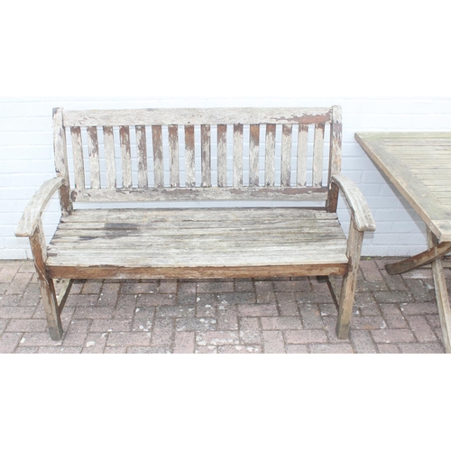 326 - Teak garden table, approx 160cm x 105 x 75cm, and a wooden garden bench (2)