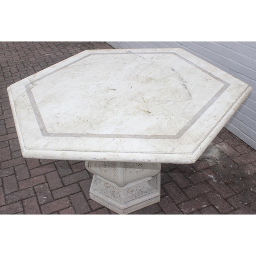 328 - Hexagonal marble topped garden table 118cm diam x 79cm H with pedestal base