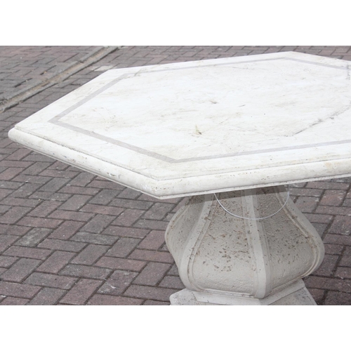 328 - Hexagonal marble topped garden table 118cm diam x 79cm H with pedestal base