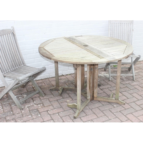 332 - Dropleaf teak garden table with 2 folding chairs, table approx 120cm x 120cm x 75cm