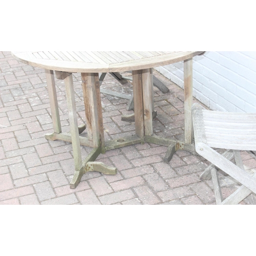 332 - Dropleaf teak garden table with 2 folding chairs, table approx 120cm x 120cm x 75cm