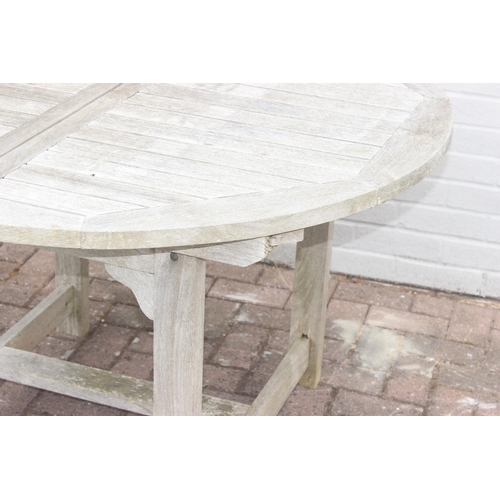 336 - Extending teak garden table, approx 171cm x 120cm x 76cm (fully extended)