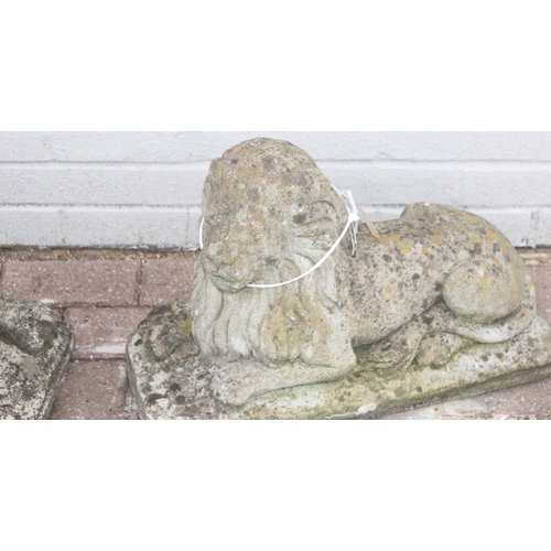 341 - Pair of concrete lion garden statues/ornaments, approx 55cm long x 40cm H