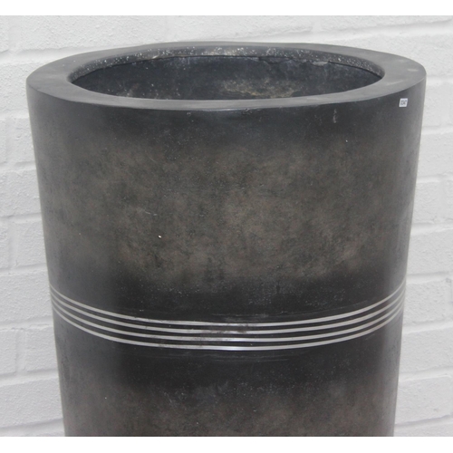 347 - A large black coloured and silver striped fiberglass garden pot of inverted conical form, approx 50c... 