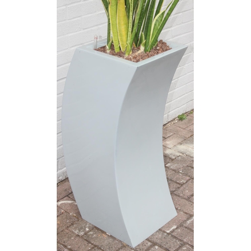 348 - A large grey coloured and fiberglass garden pot of curved form, with plant, approx 35cm x 40cm x 91c... 