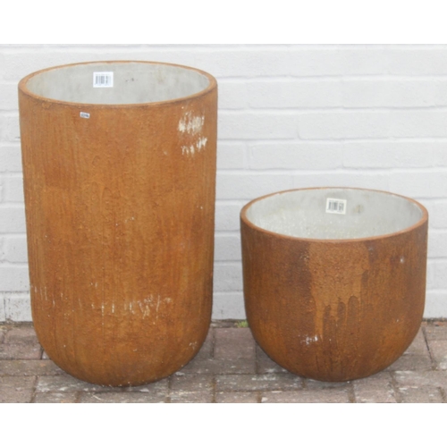 350 - 2 ceramic garden pots of rounded cylindrical form, terracotta finish, the largest approx 43cm in dia... 