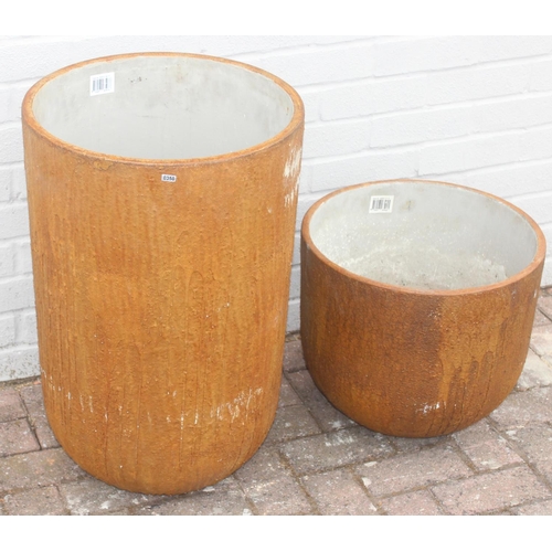 350 - 2 ceramic garden pots of rounded cylindrical form, terracotta finish, the largest approx 43cm in dia... 