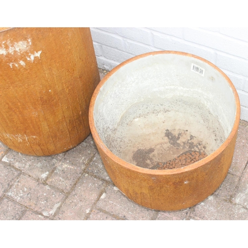 350 - 2 ceramic garden pots of rounded cylindrical form, terracotta finish, the largest approx 43cm in dia... 