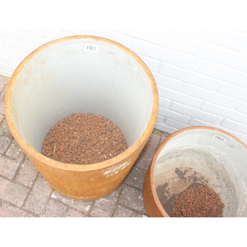 350 - 2 ceramic garden pots of rounded cylindrical form, terracotta finish, the largest approx 43cm in dia... 