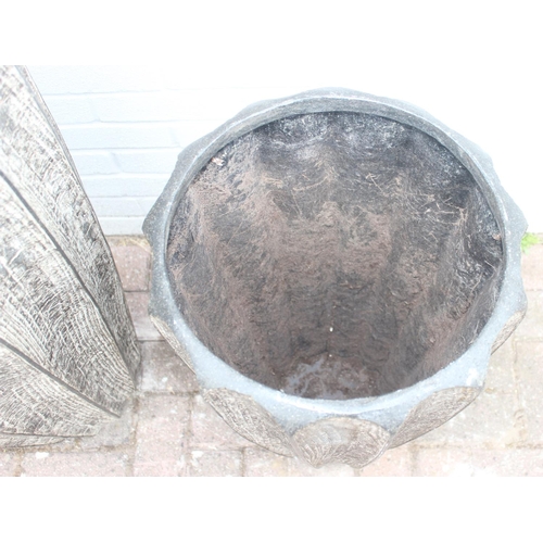 352 - 2 fiberglass garden planters of ribbed bark effect form, the largest approx 46cm x 92cm