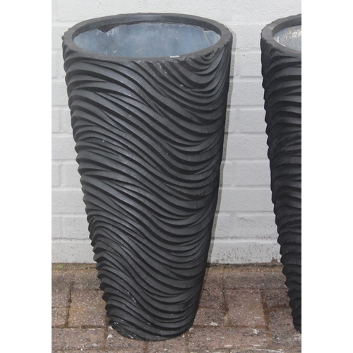 353 - A pair of black fiberglass planters of wavy textured form, approx 39cm x 75cm