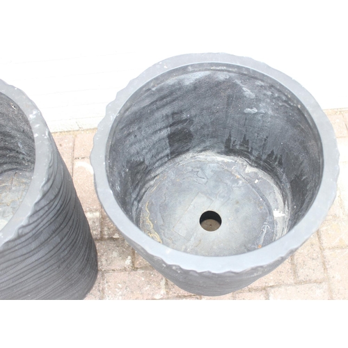 354 - A pair of black fiberglass planters of wavy textured form, approx 39cm x 75cm